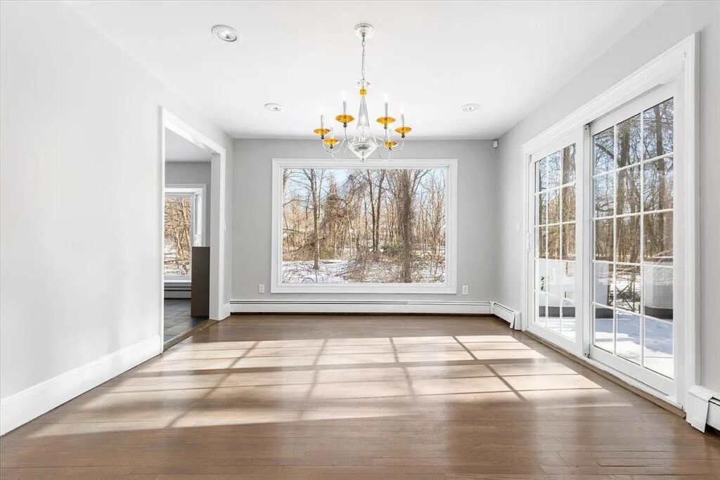 Dining room opening to the rear through new french doors