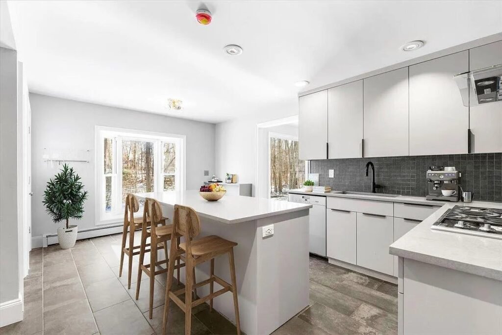 Kitchen island with seating and pendant lighting