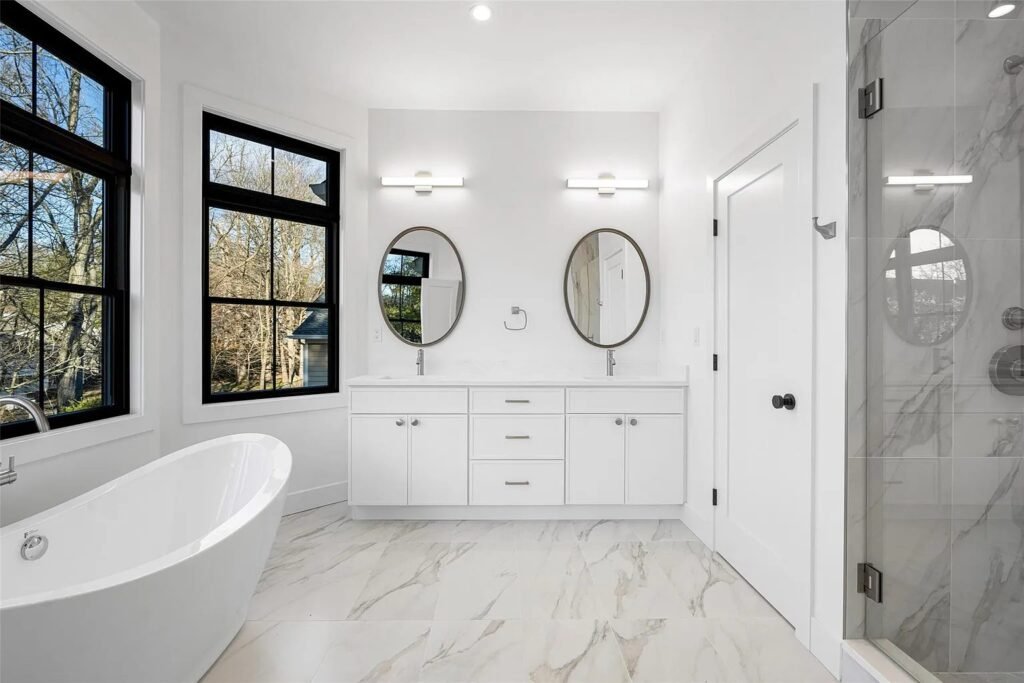 Primary bathroom with a freestanding tub and walk-in shower