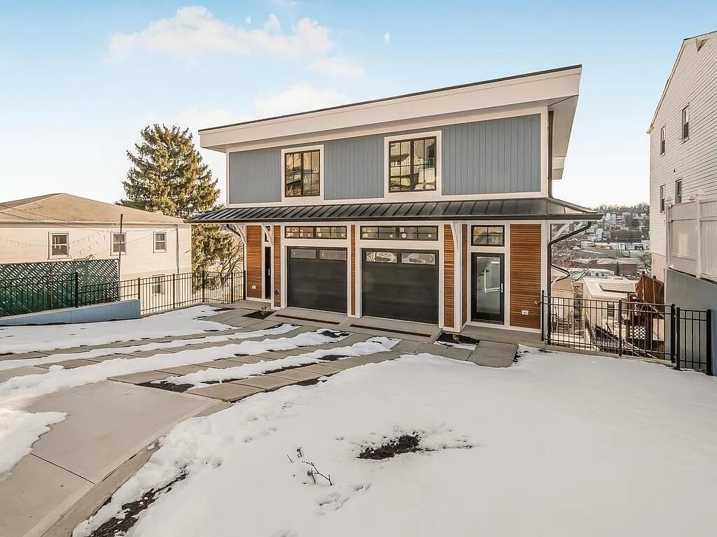 Multi-family building exterior on a sloping site