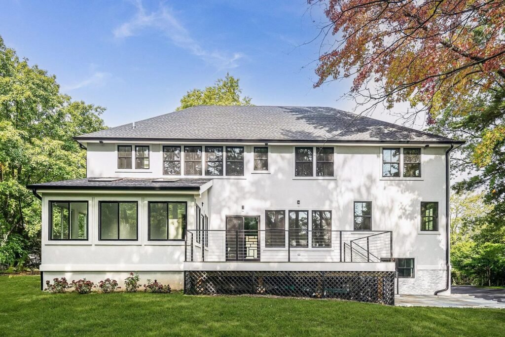 Rear elevation with deck and level lawn
