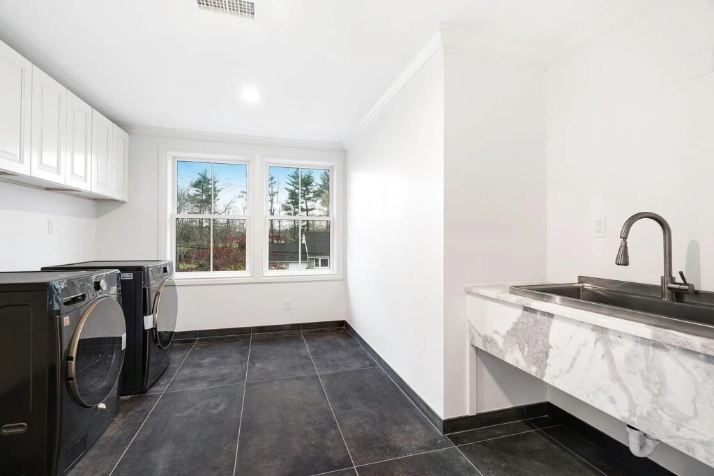 Kitchen and dining with white cabinetry