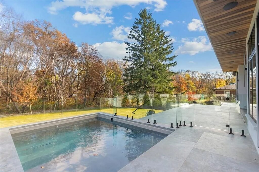 Pool terrace and lawn in daylight