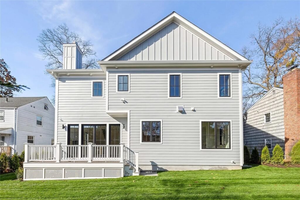 Rear elevation with deck and level yard