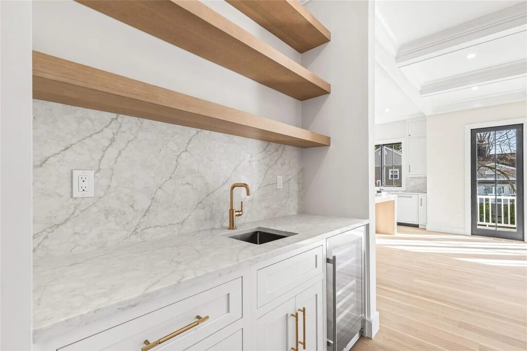 Wet bar clad in book-matched marble